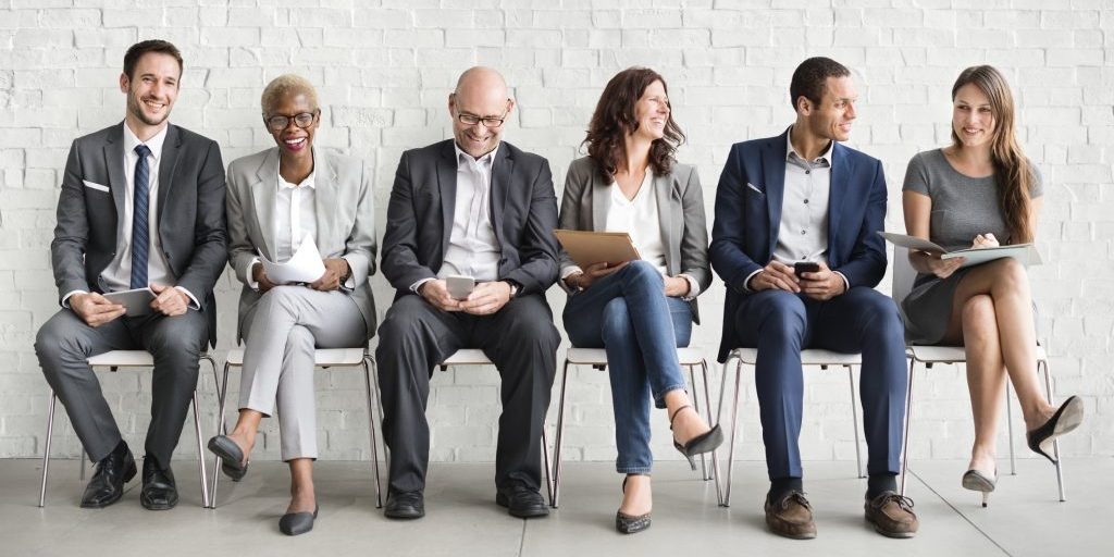 Group of diverse people are waiting for a job interview